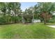 View of the metal carport and shed in the property's backyard at 12681 Se 54Th Ave, Belleview, FL 34420