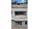 Exterior views of a house under construction featuring concrete block walls and an unfinished roof at 13322 Sw 85 Cir, Ocala, FL 34473