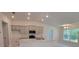 Modern kitchen with stainless appliances, recessed lighting, and granite counters at 13585 Sw 51St Ln, Ocala, FL 34481