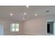 Bright living room area featuring recessed lighting and natural light at 13585 Sw 51St Ln, Ocala, FL 34481