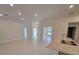 Open-concept living area with bright natural light and recessed lights at 13585 Sw 51St Ln, Ocala, FL 34481