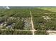 Scenic aerial perspective showcasing homes and expansive forested property at 13741 Sw 73Rd St, Ocala, FL 34481