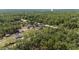 Expansive aerial view showcasing home sites amid a lush green forest landscape at 13741 Sw 73Rd St, Ocala, FL 34481