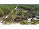 Expansive aerial view of a charming rural property with mature trees and a long driveway at 13741 Sw 73Rd St, Ocala, FL 34481