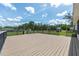 Expansive back deck overlooking the large, lush, treed backyard at 13741 Sw 73Rd St, Ocala, FL 34481