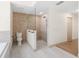 Modern bathroom with a spacious glass shower and neutral tile at 13741 Sw 73Rd St, Ocala, FL 34481