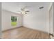 Cozy bedroom with natural light and a ceiling fan at 13741 Sw 73Rd St, Ocala, FL 34481