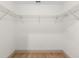 Walk-in closet featuring metal shelving for optimal storage at 13741 Sw 73Rd St, Ocala, FL 34481