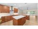 Spacious kitchen with wood floors, stainless hood, and lots of counterspace at 13741 Sw 73Rd St, Ocala, FL 34481