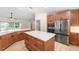 Kitchen features island, wood floors, stainless appliances, and lots of counterspace at 13741 Sw 73Rd St, Ocala, FL 34481