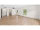 Large open living area with multiple windows and wood flooring at 13741 Sw 73Rd St, Ocala, FL 34481