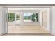 Enclosed patio with sliding doors and windows overlooking the backyard at 13741 Sw 73Rd St, Ocala, FL 34481