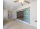 Enclosed patio with sliding door leading to the backyard at 13741 Sw 73Rd St, Ocala, FL 34481