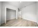 Bright bedroom with an expansive closet and wood-look floors at 13780 Sw 42Nd Court Rd, Ocala, FL 34473