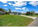 Beautiful single-Gathering home with a well-maintained lawn, long driveway, and attached two car garage at 13780 Sw 42Nd Court Rd, Ocala, FL 34473