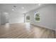 Bright, open-concept living area with sleek flooring and natural light at 13780 Sw 42Nd Court Rd, Ocala, FL 34473