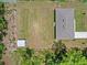 Aerial shot of the property showing the house, shed, and surrounding land at 15138 Sw 50Th Avenue Rd, Ocala, FL 34473