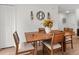Comfortable dining area featuring wood table and chairs near closet at 15138 Sw 50Th Avenue Rd, Ocala, FL 34473