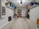 Spacious garage with shelving, storage, and an automatic door opener at 15138 Sw 50Th Avenue Rd, Ocala, FL 34473