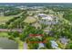 Beautiful neighborhood aerial view with mature trees and landscaping at 1630 Se 29Th Ter, Ocala, FL 34471