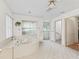 Spacious bathroom with jacuzzi tub, tile flooring, and bright lighting at 1630 Se 29Th Ter, Ocala, FL 34471