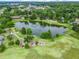 Beautiful pond with a fountain in a well-maintained community park and play area at 1630 Se 29Th Ter, Ocala, FL 34471