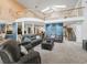 Spacious living room with vaulted ceilings and second-floor balcony access at 1630 Se 29Th Ter, Ocala, FL 34471
