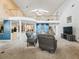 Open-concept living space with second-floor balcony and ample natural light at 1630 Se 29Th Ter, Ocala, FL 34471