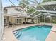 Screened pool area offering seamless transition from indoor to outdoor living at 1630 Se 29Th Ter, Ocala, FL 34471