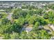 An aerial perspective of a home nestled in a vibrant neighborhood, showcasing its proximity to local amenities and urban landscape at 1636 Sw 5Th Pl, Ocala, FL 34471
