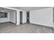 Open-concept living area with light-colored floors, neutral walls, and recessed lighting at 1636 Sw 5Th Pl, Ocala, FL 34471