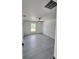 Spacious bedroom featuring ample natural light and neutral color palette at 1780 Winding Hills Rd, Dunnellon, FL 34431