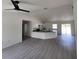 Open-concept kitchen and living area, featuring an island at 1780 Winding Hills Rd, Dunnellon, FL 34431