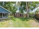The backyard features a covered gazebo area and a well-maintained lawn for outdoor enjoyment at 1841 Ne 38Th St, Ocala, FL 34479
