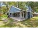 Expansive view of the home's backyard, complete with a large, covered patio at 1841 Ne 38Th St, Ocala, FL 34479