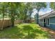 Spacious backyard view with a gazebo and privacy fence at 1841 Ne 38Th St, Ocala, FL 34479