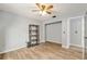 Bedroom featuring hardwood floors, minimalist decor, and natural light at 1841 Ne 38Th St, Ocala, FL 34479