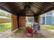 View of the gazebo with a grill and seating area at 1841 Ne 38Th St, Ocala, FL 34479