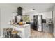 Modern kitchen showcases stainless steel appliances, granite countertops, and a stylish center island at 1841 Ne 38Th St, Ocala, FL 34479