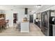 Updated kitchen with stainless appliances, granite countertops, and a convenient center island with seating at 1841 Ne 38Th St, Ocala, FL 34479