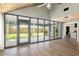Bright living room boasts natural light with access to an outdoor patio and fenced backyard at 1841 Ne 38Th St, Ocala, FL 34479