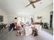 Cozy living room with neutral walls, a ceiling fan and a variety of furniture arrangements at 2131 Ne 145Th Avenue Rd, Silver Springs, FL 34488