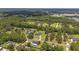 High-angle view of houses in a verdant area, highlighting community and natural surroundings at 2151 Se 59Th St, Ocala, FL 34480