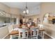 Charming dining area leads to a cozy living room, perfect for Gathering gatherings and entertaining guests at 2151 Se 59Th St, Ocala, FL 34480