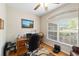 Bright office with hardwood floors and large window overlooking the neighborhood at 2151 Se 59Th St, Ocala, FL 34480