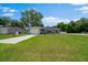 Charming one-story home with a well-maintained lawn and attached one-car garage at 3094 Se 144Th Pl, Summerfield, FL 34491