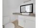 Bright bathroom featuring a modern vanity, vessel sink, and granite countertop at 329 Marion Oaks Blvd # A3, Ocala, FL 34473