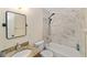 Bathroom boasts updated vanity, sink, fixtures, mirror, and shower over tub at 3428 Ne 17Th Ter, Ocala, FL 34479