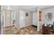Entryway with tiled floors, multiple doors, and access to other rooms in the home at 3428 Ne 17Th Ter, Ocala, FL 34479