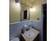 Bright bathroom featuring a vanity, mirror, and functional fixtures for a well-appointed and comfortable space at 3709 Ne 4Th St, Ocala, FL 34470